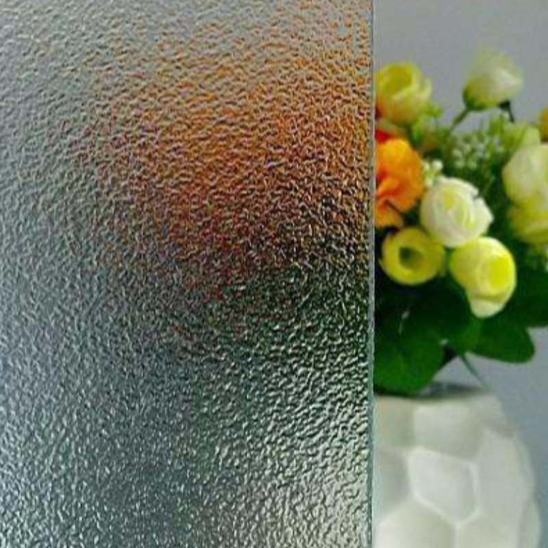 CLEAR A TINTED PATTERNED GLASS